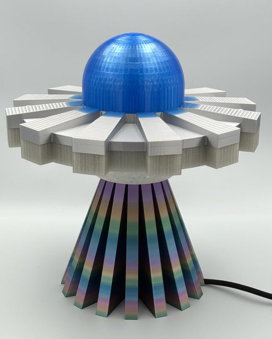 Blue and silver UFO lamp with rainbow metallic base