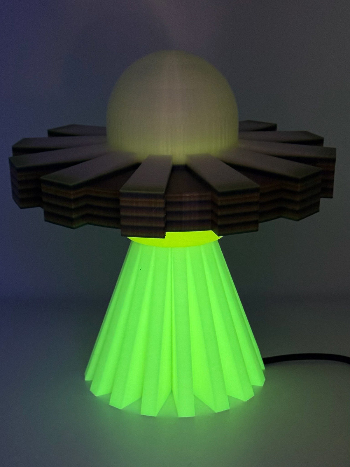 Lemon and Cream UFO lamp with green glow under the saucer