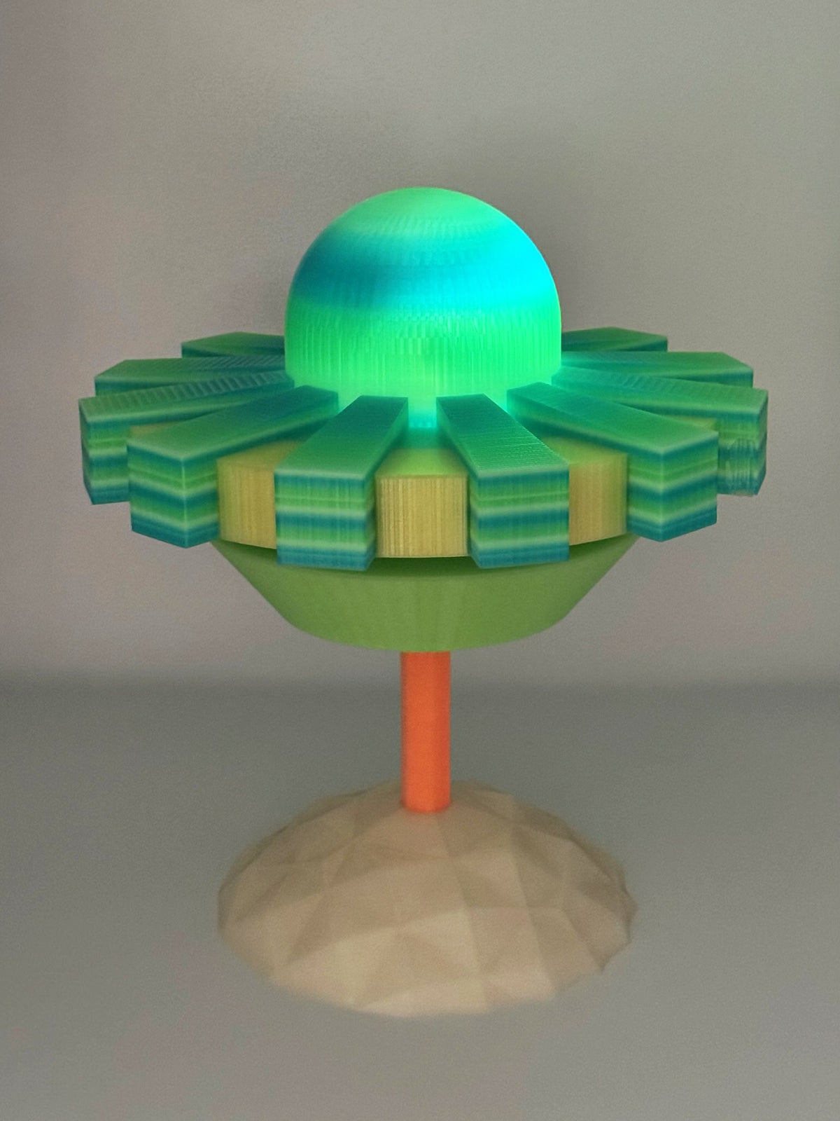 UFO lamp mounted on a totem pole and base using the totem attachment kit