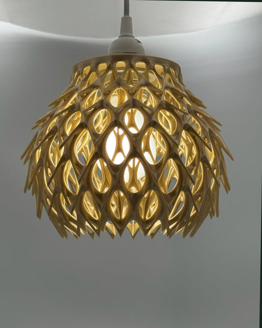 Gold Wicked Weed 3D printed pendant lamp glowing with spiky lattice dome