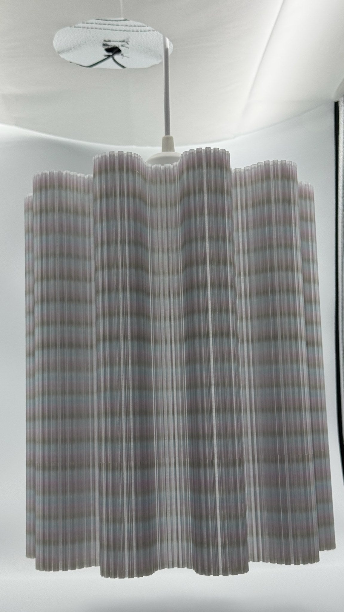 Gray Metallic Architecture pendant lamp hanging, side view