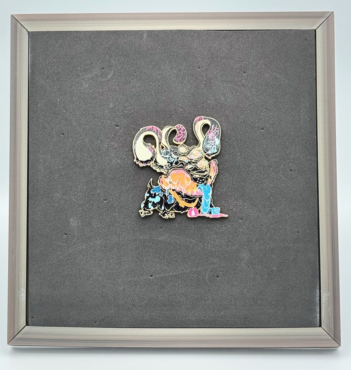 Gray 3D printed pin display frame with foam board