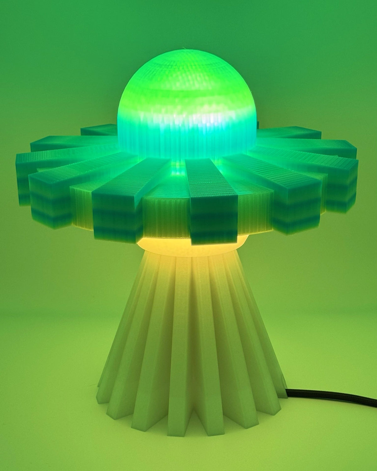 Green Glow and Cream UFO lamp glowing green