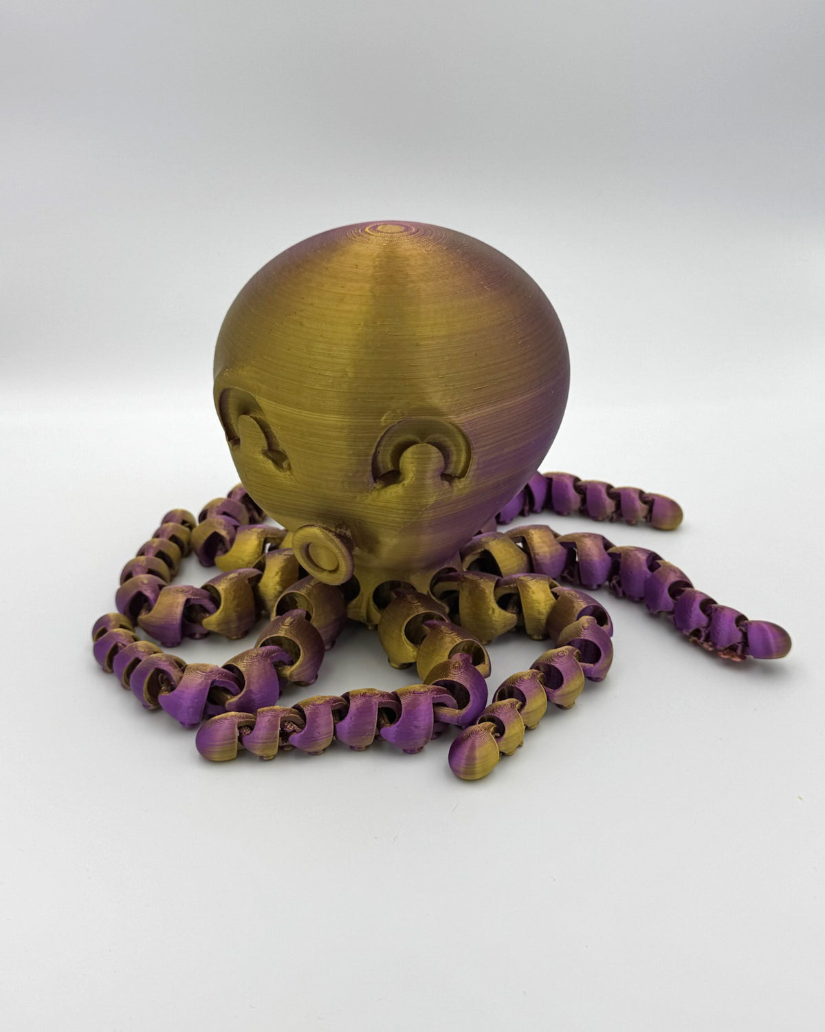 Green and purple metallic Kraken 3D printed octopus totem