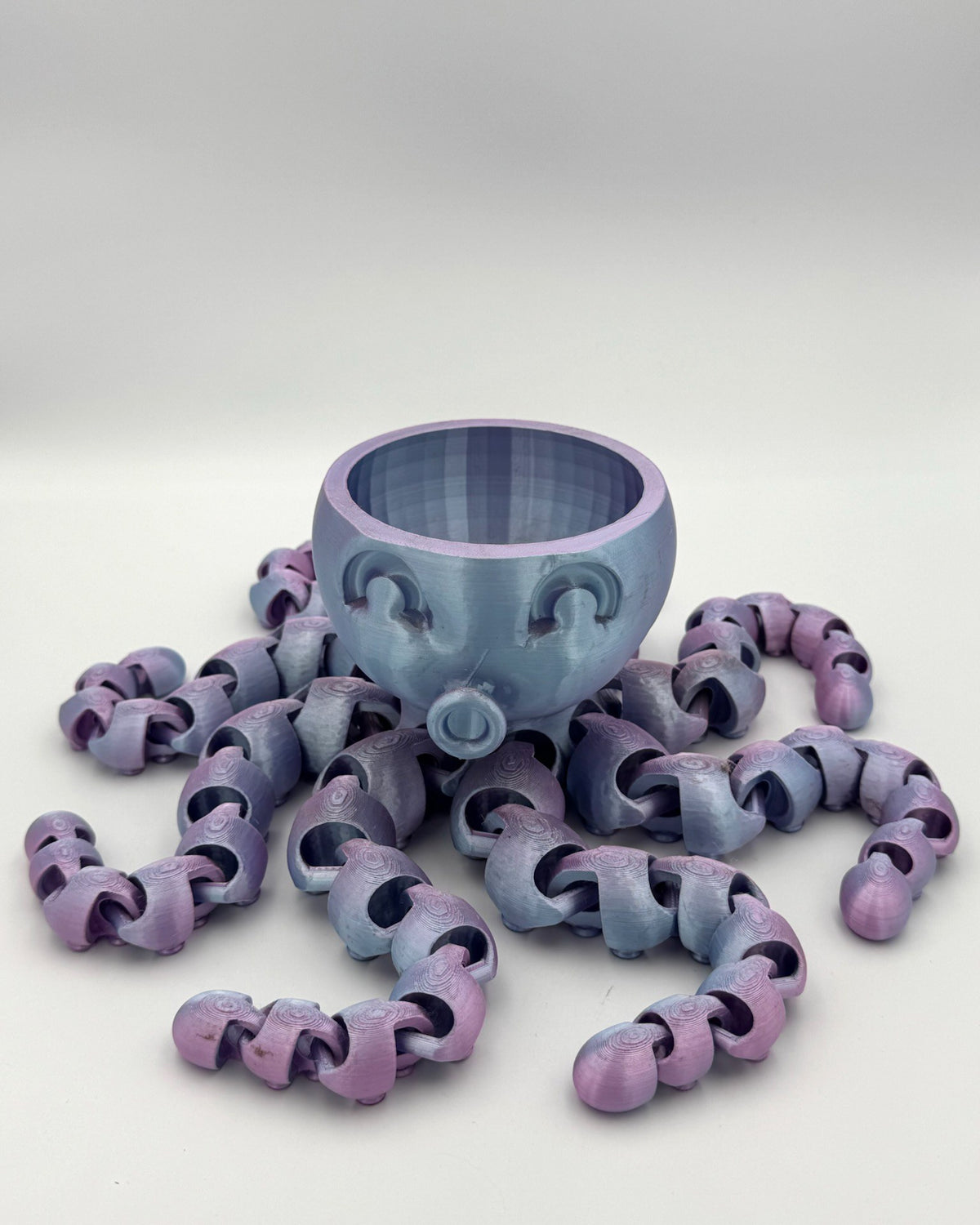 Light purple Kraken 3D printed octopus totem with articulated tentacles