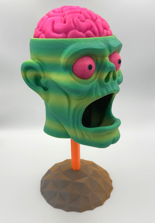 Spookiez Pink Brain Zombie 3D printed totem head with green skin and pink brain on a totem pole and base