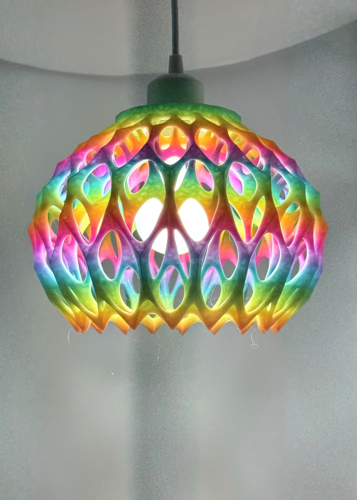 Rainbow Disco 3D printed pendant lamp glowing in rainbow colors