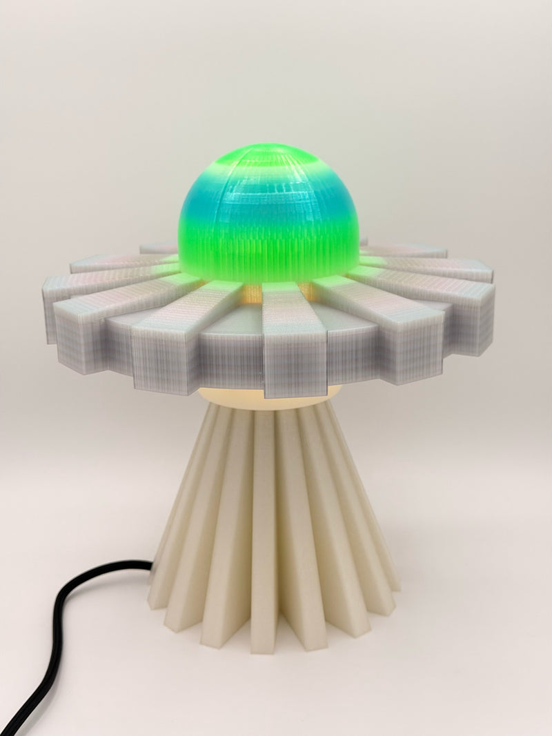 Neon green and silver 3D printed UFO lamp with aqua-to-green dome, translucent silver saucer and cream pleated base