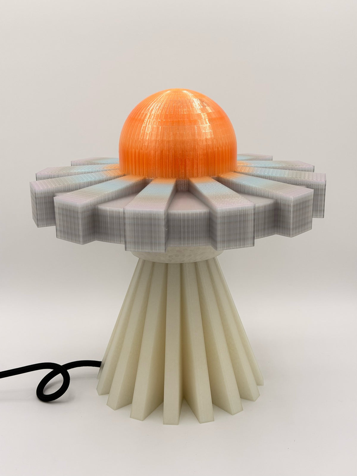 Tangerine and silver 3D printed UFO lamp with orange dome, silver saucer and cream pleated base