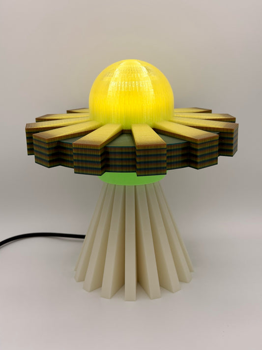 Lemon and cream 3D printed UFO lamp with yellow dome, yellow and black saucer and cream base